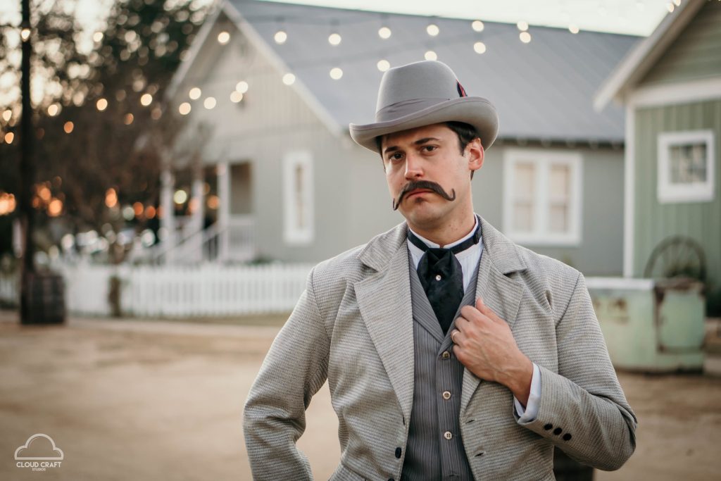 old fashioned man in grey suit